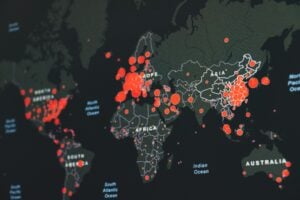World map visualization showing global cyber activity hotspots highlighted across multiple regions